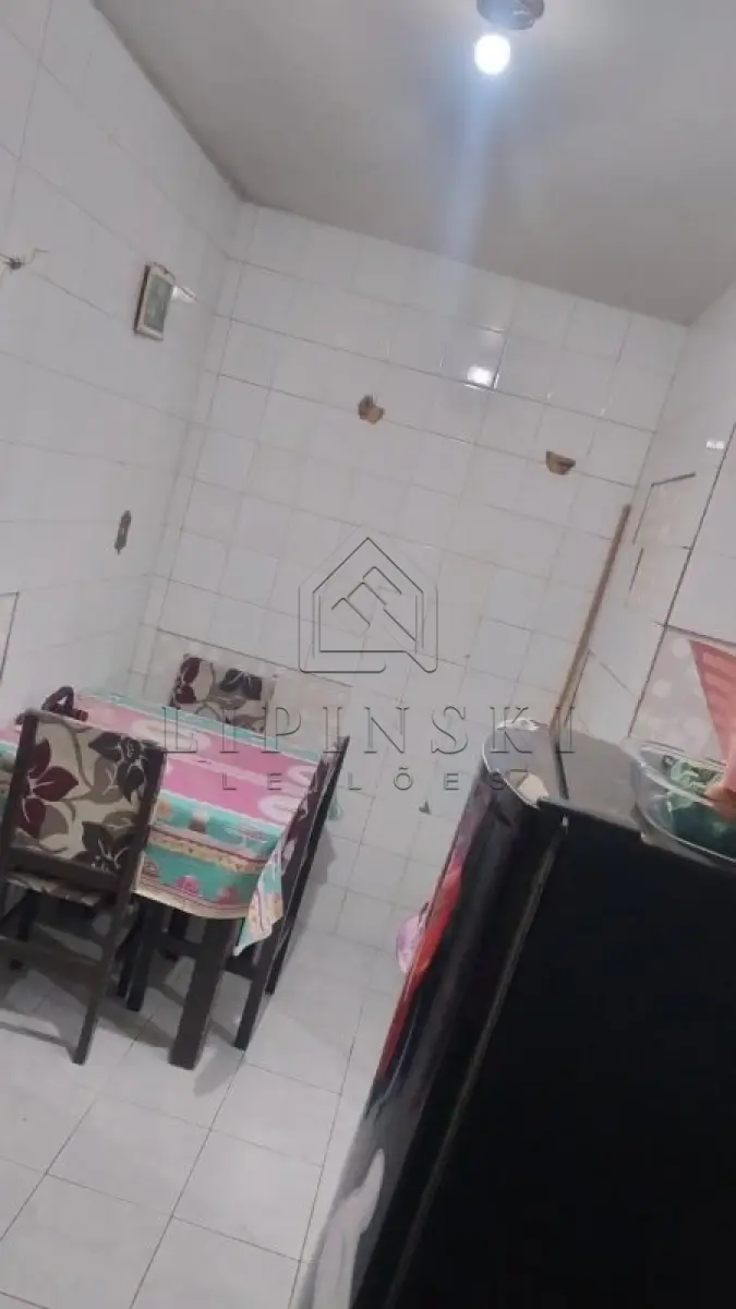 LOTE 001 - Apartamento Térreo