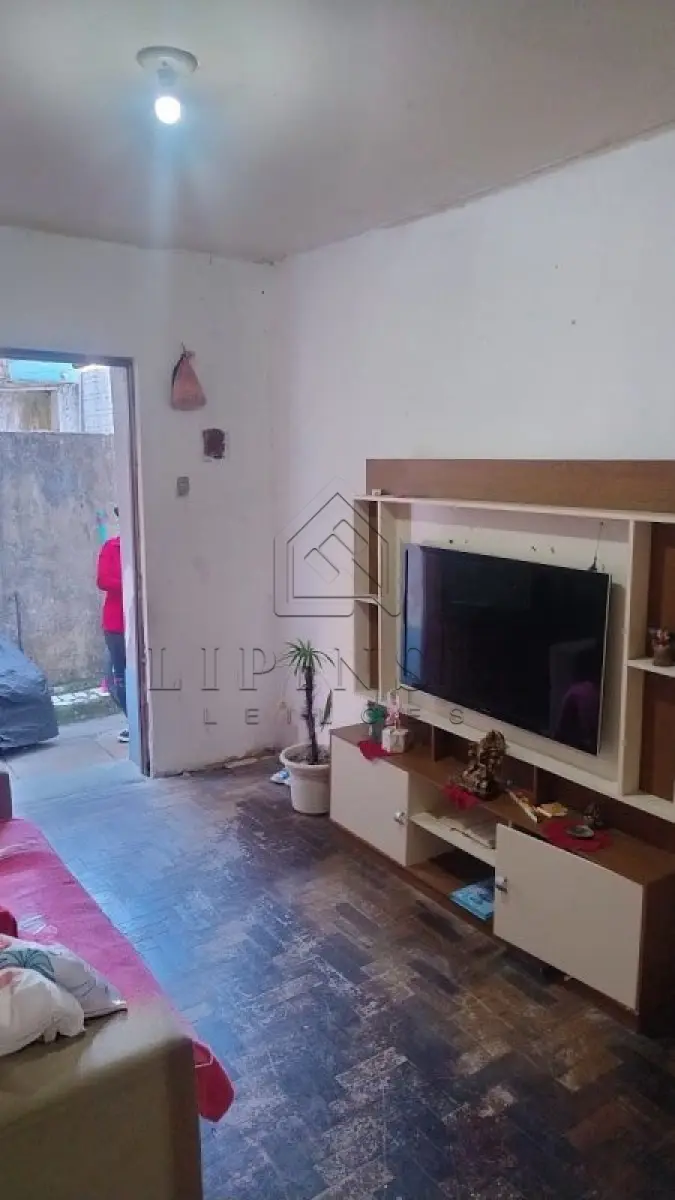 LOTE 001 - Apartamento Térreo